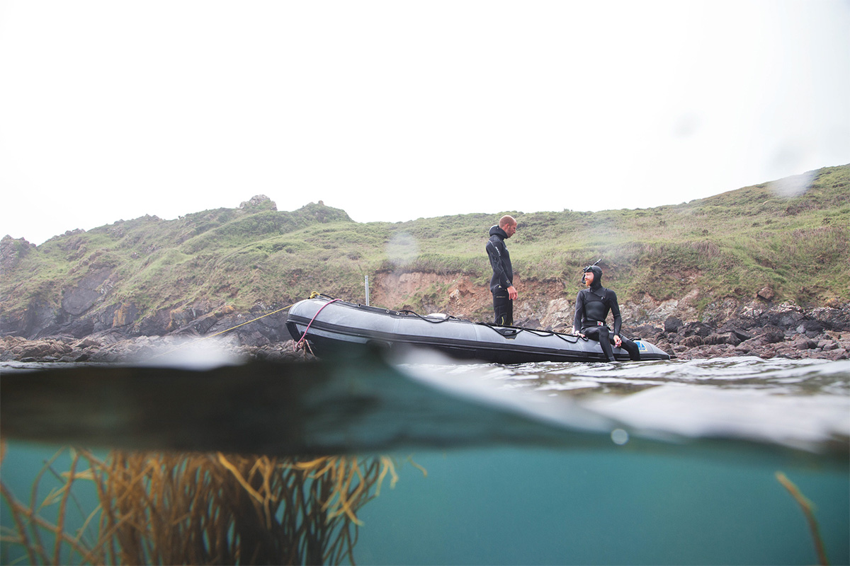the team from the cornish seaweed company harvesting seaweed from the coast of cornwall