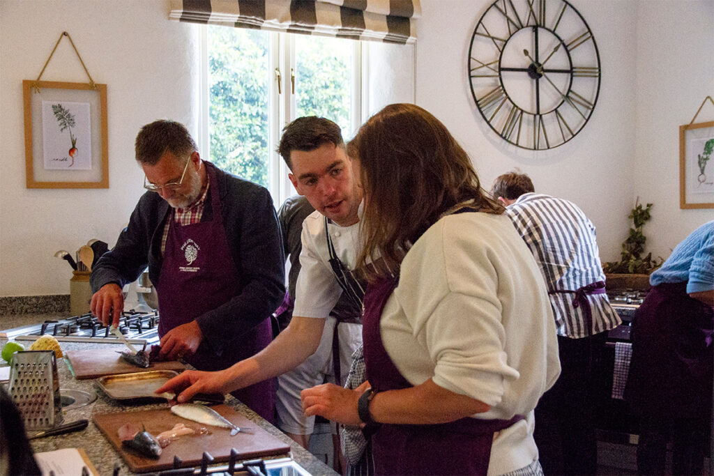 chef christian sharp teaching fish cookery at philleigh way cookery school