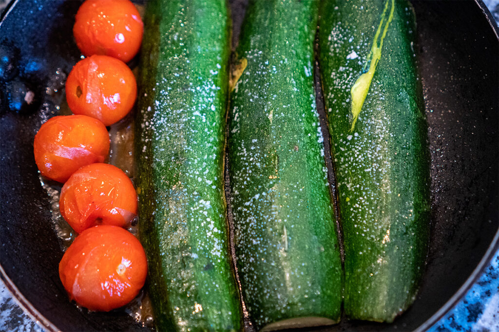 charring courgettes and tomatoes